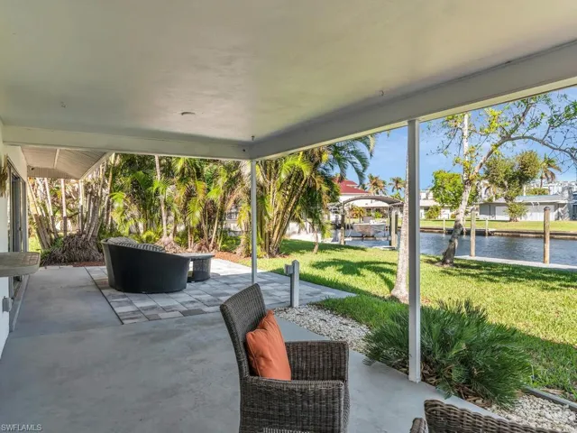 View of patio / terrace with a water view