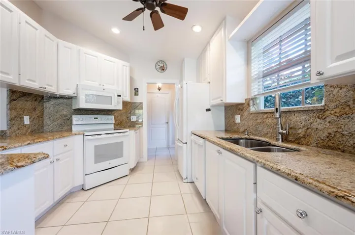 The kitchen is off the front entrance