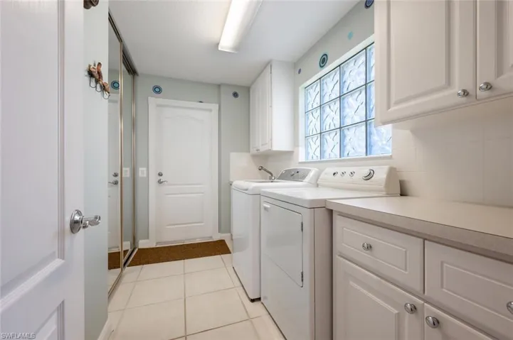 The Laundry Room has Cabinet Storage, Laundry Tub, Pantry Closet and access to the 2-car garage