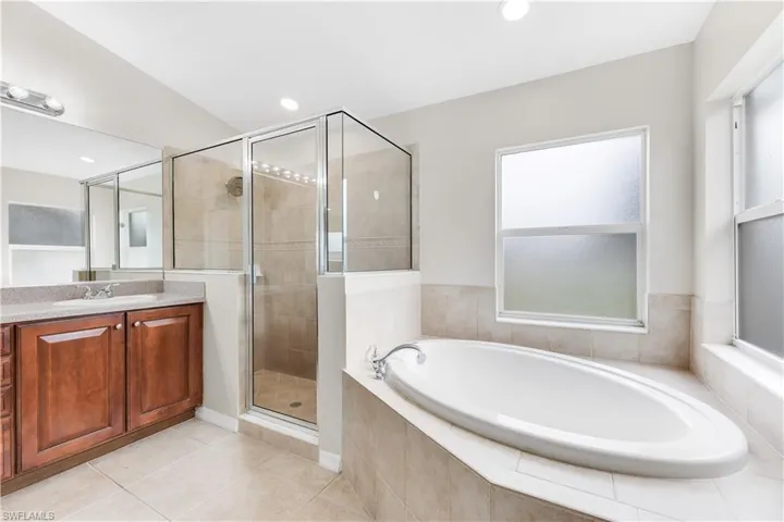Soaking tub, glass shower and double sinks