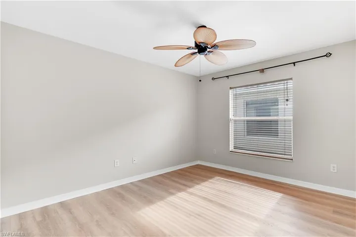 Second bedroom with wood look laminate