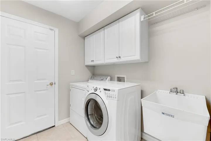 Separate laundry room with access to the 2 car garage