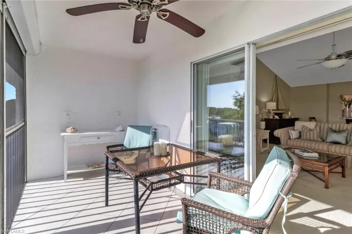 Balcony featuring ceiling fan