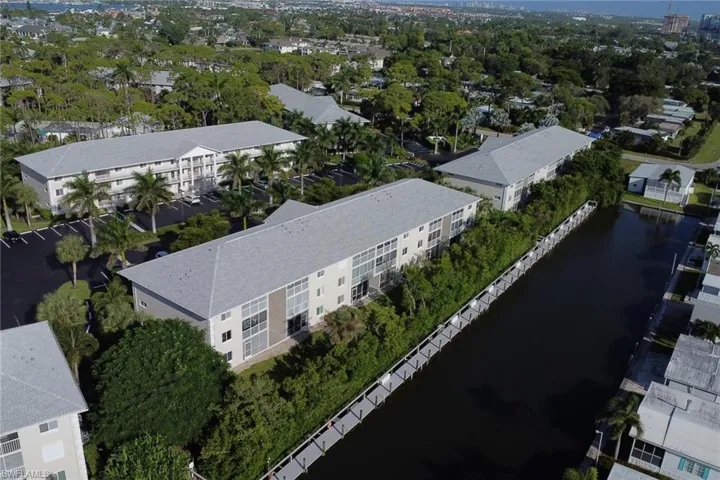 Bird's eye view of a large body of water and apartment complex