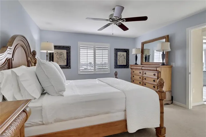 Bedroom featuring carpet floors and a ceiling fan
