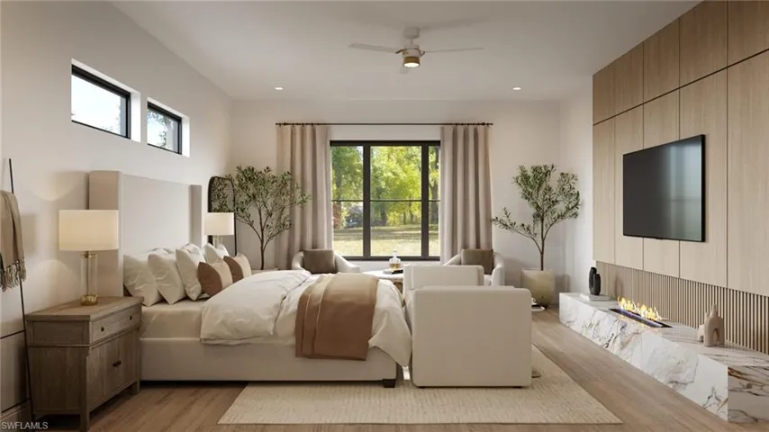 Photos are of a similar home by builder and are for illustrative purposes only. Bedroom featuring a ceiling fan, light wood-style flooring, and recessed lighting.