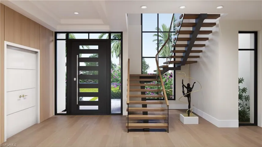 Architectural rendering. Plans and finishes can be customized. Entrance foyer with light wood-style floors, expansive windows, recessed lighting, and stairs.