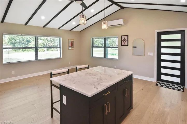 This spacious dolomite countertop island is both a gathering place and a great space for food prep.