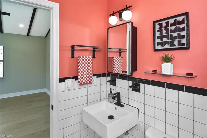 Imagine starting your day in this cheerfully designed space with such a flattering color.