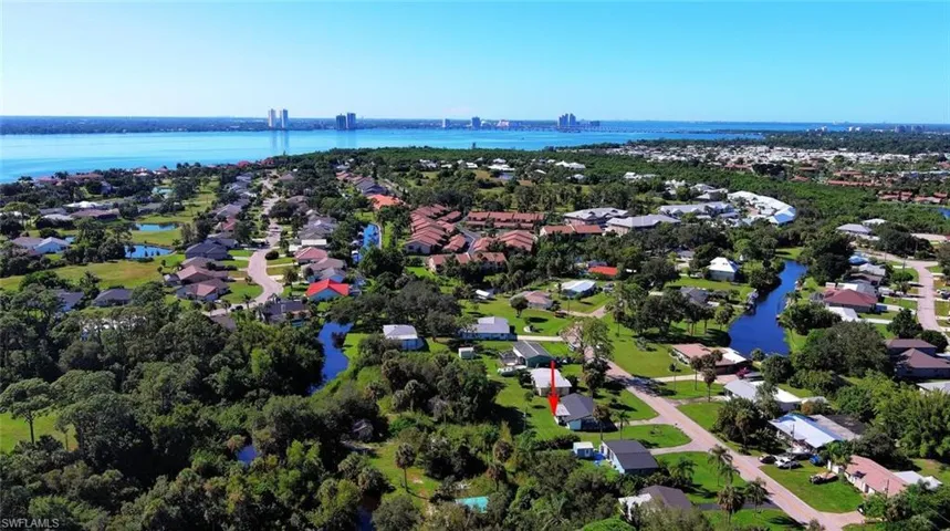 Aerial overview of property's location with the Caloosahatchee River in the distance.
