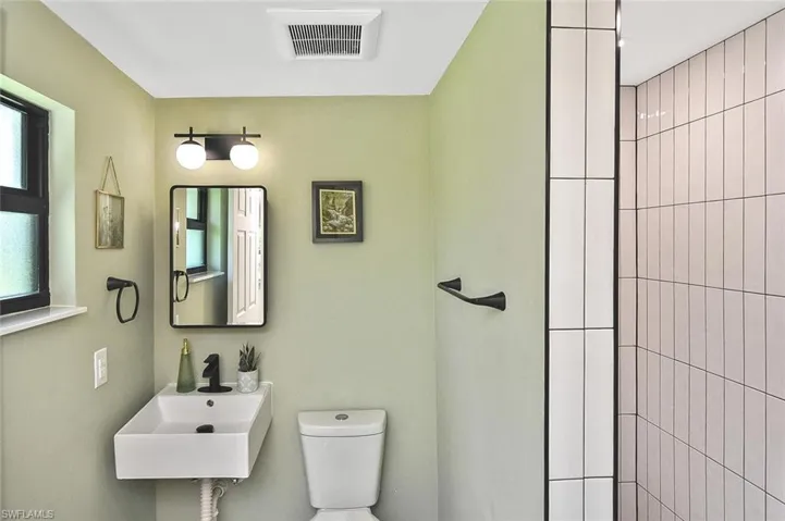 Soft sage green tones offer a beautiful accent.