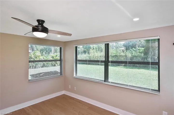 Windows overlook the generously-sized backyard, with plenty of room for a pool.
