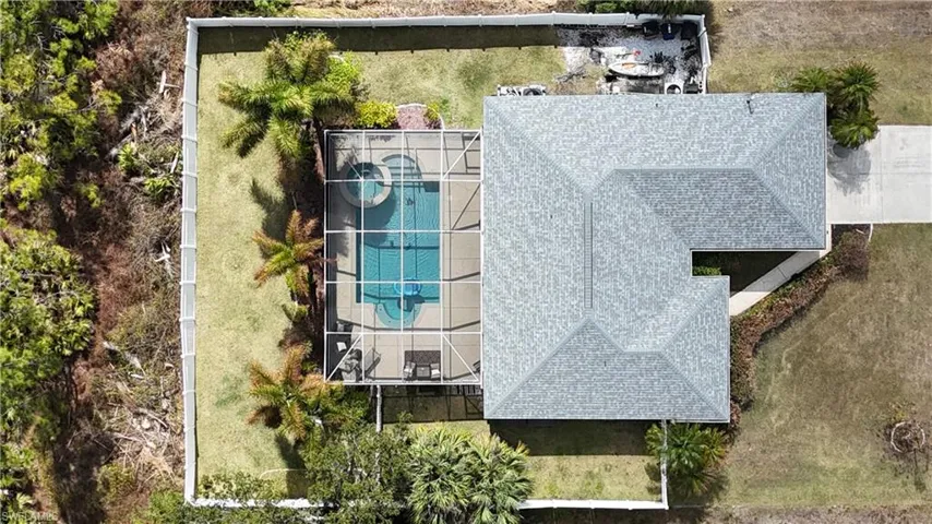 View from above of property featuring a pool area
