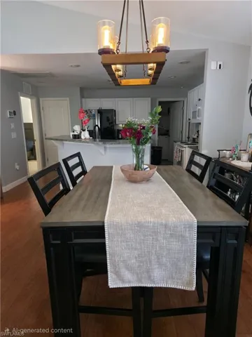 Dining room featuring wood-type flooring