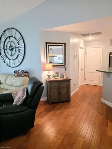 Living room with light wood-style floors