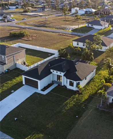 Birds eye view of property with a residential view