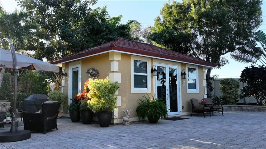 View of outbuilding with french doors