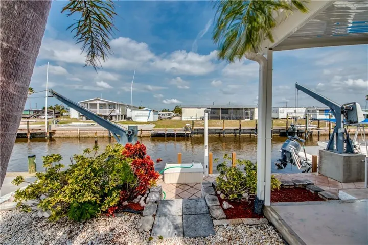 Dock with a water view and boat lift