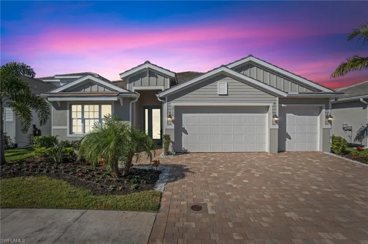 View of front of home featuring a garage