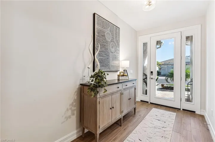 Doorway featuring light hardwood / wood-style flooring