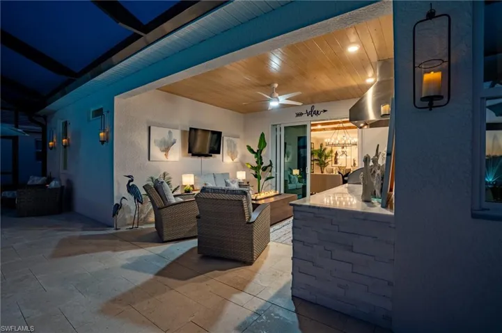 View of patio featuring ceiling fan