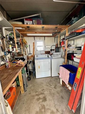 Spacious shed where the washer & dryer are located.