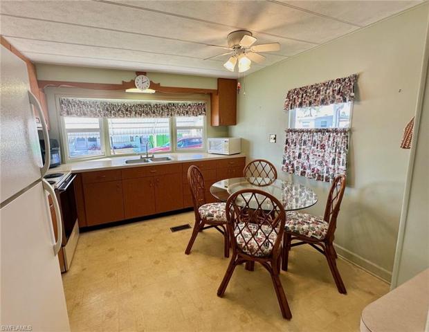 Spacious open kitchen with ample counters, and an expansive bay window!