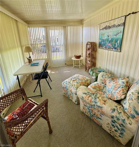 Neutral carpet in the Florida room.