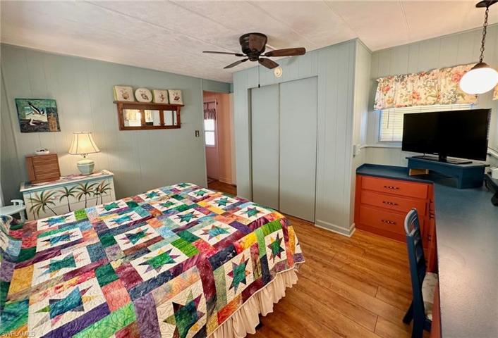 Ceiling fan and laminate flooring in the Master Bedroom.