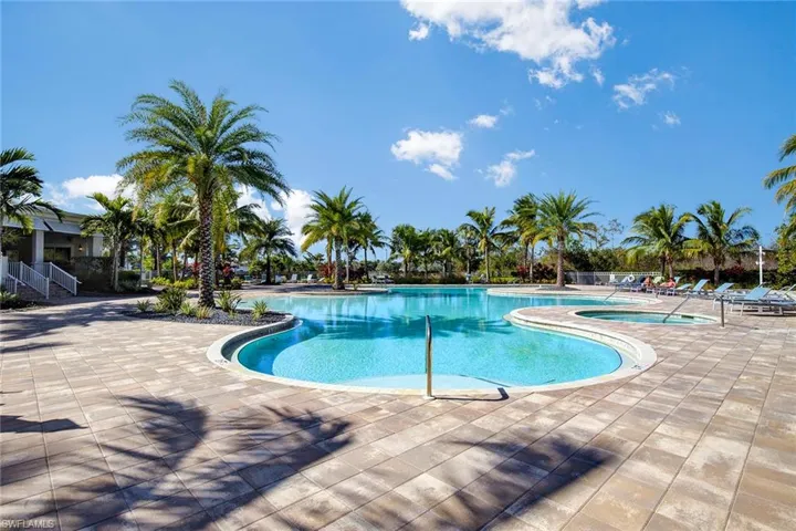 Community pool featuring a patio area