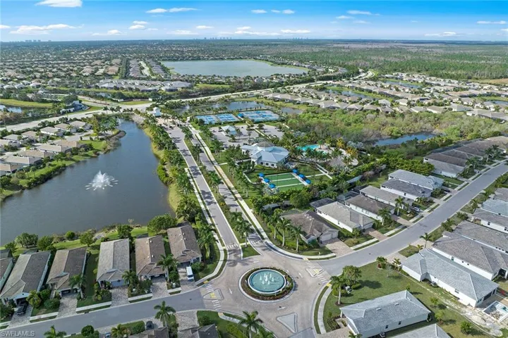 View of property location with nearby suburban area and a large body of water