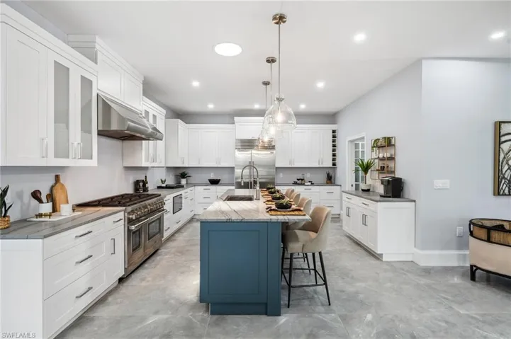 High end appliances: Wolf Range and Microwave, Sub Zero Fridge