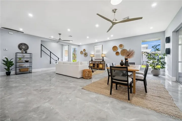 Recessed lights and modern fans throughout the main floor