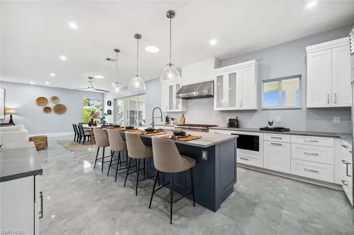 Modern, alternate color cabinets in the kitchen