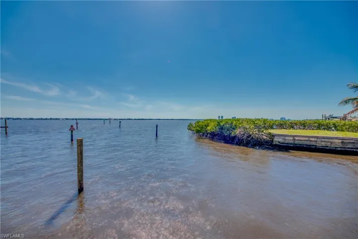 Dock featuring a water view