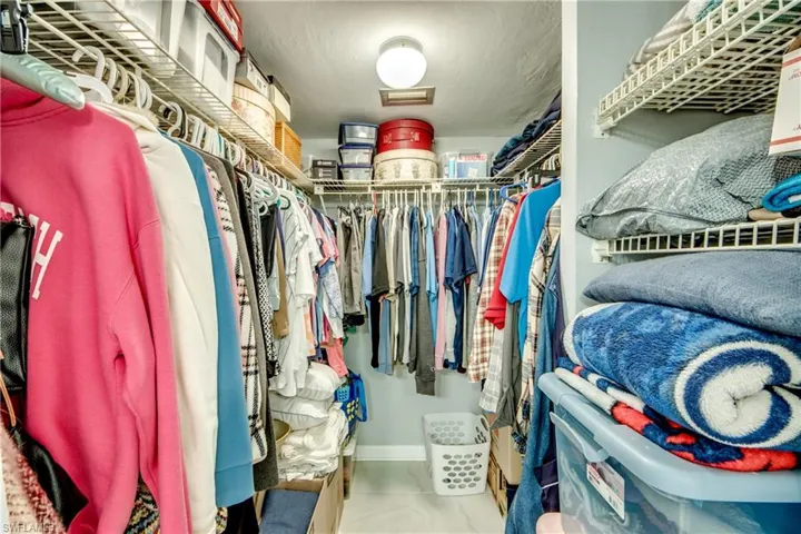 Walk in closet with attic access