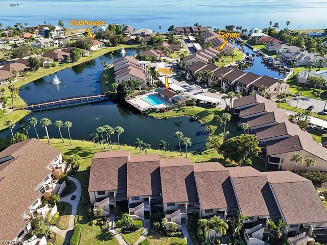 Aerial view of residential area with a large body of water