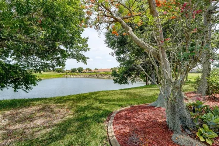 View of yard with a water view