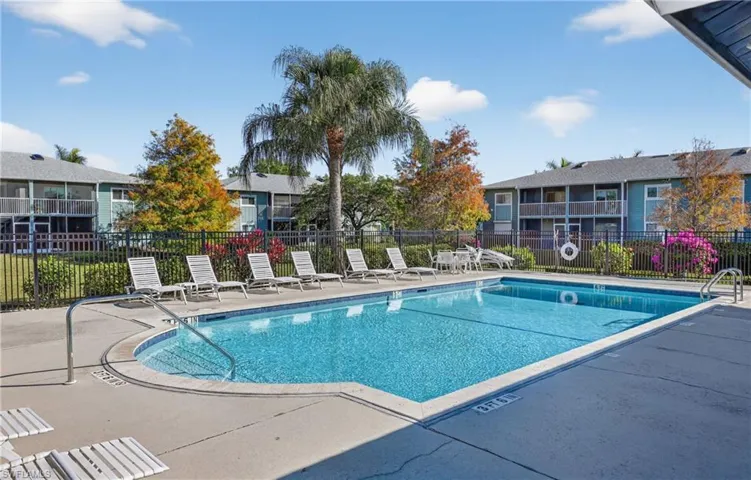 Community pool featuring a patio area