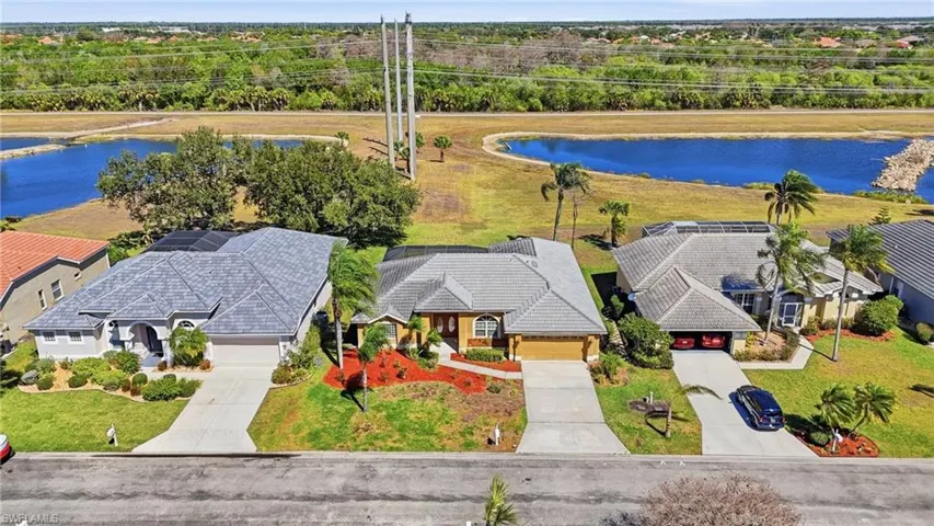 Aerial view of residential area with a large body of water