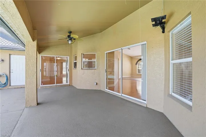 View of patio with ceiling fan