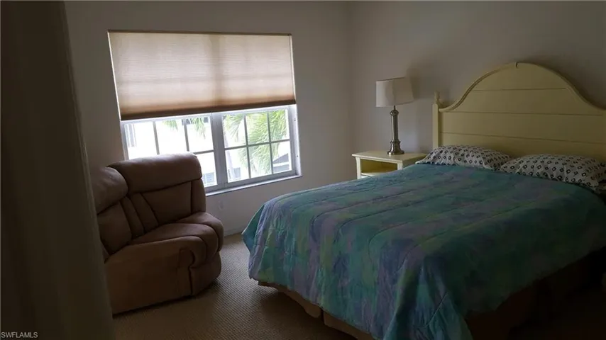 Bedroom featuring carpet flooring