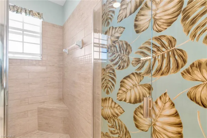 Full bath featuring a stall shower