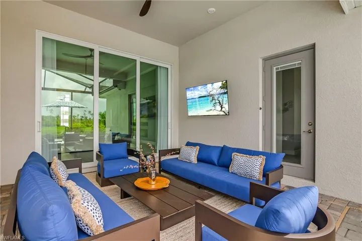 View of patio / terrace featuring an outdoor living space and ceiling fan