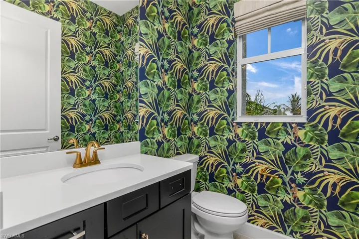 Bathroom with toilet and vanity