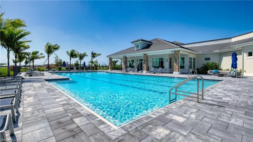 View of swimming pool with a patio area