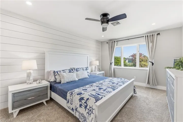 Primary bedroom with king sized bed