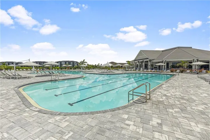 Community pool featuring a patio area