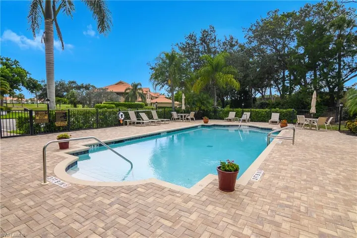 Subdivision pool featuring a patio area