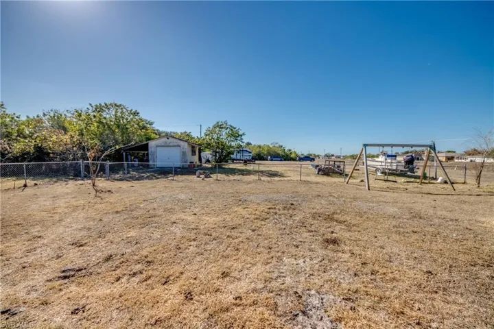 View of yard with a playground